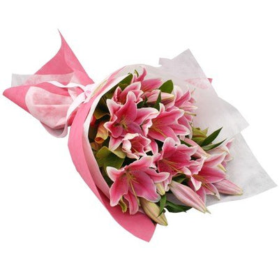 Pretty Pink Lilies Bouquet 
 Wrapped in Special Pink Paper packing
 Free Message card
