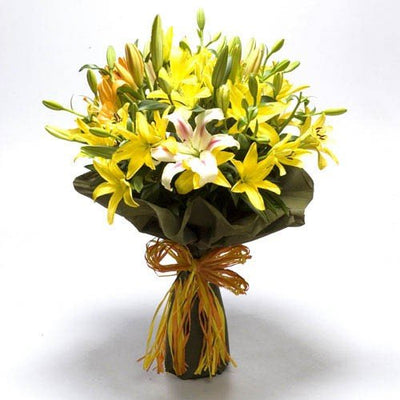  10 stem exotic lilies pretty bouquet
 Wrapped in special paper wrap
 Free Message Card.
