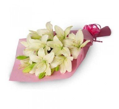  5 stem white lilies hand bunch.
 Free Message card.