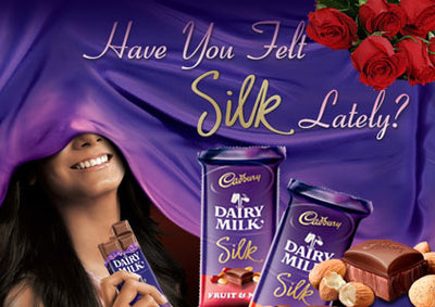  4 Cadbury silk (69 gm each)
 2 Big Cadbury Silk (160 gm each) 
 Bouquet of 10 LS Red Roses 
Wrapped nicely in cellophane paper.