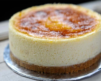 1 Kg Yummy Cheese cake ((The Taj / Radisson blu / JW marriot / Any other equivalent to 5-Star Bakery)
 Serves 2-3 People
 100% Real Cheese cream
