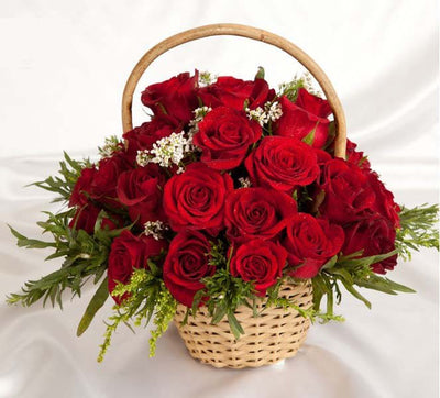 •	18 Red Roses Basket with lush green fillers..