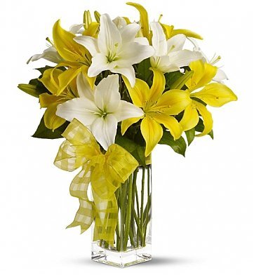  8 Stem of White and Yellow Lilies bouquet. (VASE: you can add from the add on products)
 Free Message Card