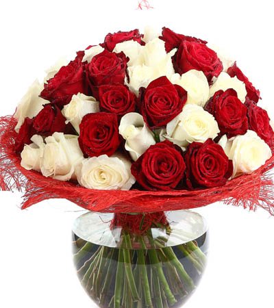 • 50 Stem White & Red Roses. 
• Free Message card. 

NOTE: Vase not included in any product unless added separately.