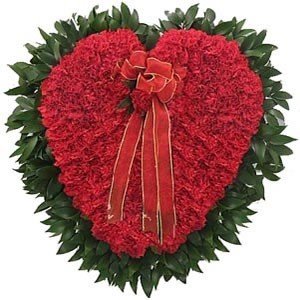 150 stem red carnations
 Arranged in basket with HEART shape design.