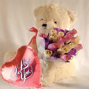  Cute Teddy Bear (Aprox 2 Feet)
 15 Multi colored Roses Bouquet  Wrapped in cellophane paper 
 Birthday Greeting Card (By Archies).