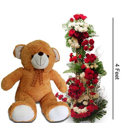  120 Mixed Flowers (Incl Roses and Carnation)
 Premium tall arrangement aprox 4 Feet height
 Big Teddy Bear aprox 2 Feet height
&#8226 Free Message card. 