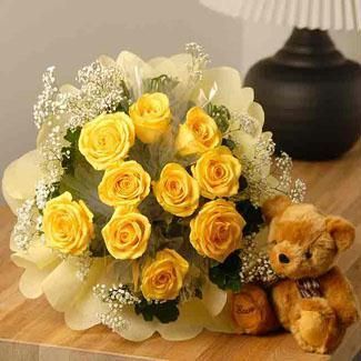 	Dozen Yellow Roses bouquet with special crape paper packing and a cute teddy bear (6 inch)
 Free Message Card