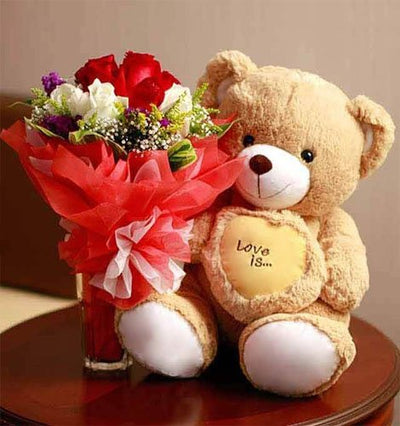 •	Bunch of Dozen Red and White Roses wrapped in special packing.
•	2 feet Teddy Bear (aprx)
