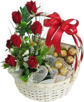 Wooden Handle Basket with 2 Box of Ferrero Rocher 16 pcs (200 gm each) 
12 Red roses arranged in the basket Free Message Card.