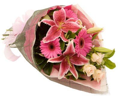  Mixed Flowers bouquet of Roses, Gerbera and Exotic Lilies 
 Wrapped in Special Paper Wrap
 Free Message card