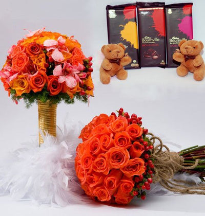  Two premium bouquet with 24 stem roses and 40 stem Roses and Exotic Lily arranged nicely 
 Three" cadbury bournville chocolates with "Two" cute small teddies
 Teddy Bear: 6 inch each
 Free Message Card.