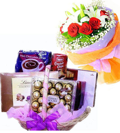 Bouquet of Red Roses and exotic Lily wrapped in special paper packing
 A Basket of premium chocolates like
 Ferrero Rocher 24 pcs, 
&#8226 Lindt Chocolate,
&#8226 Cadbury celebrations,
&#8226 Dark Chocolate Fantasy and others.