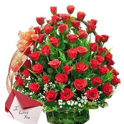 •	Basket of 60 Red Roses and lush white fillers