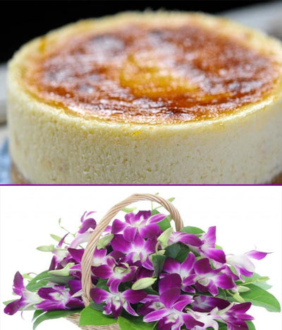  500 gm Delicious cheese cake(The Taj / Radisson blu / JW marriot / Any other equivalent to 5-Star Bakery)
 Serves 2-3 People
 Wooden basket of Purple Orchids(15 Stem)
&#8226 Please allow at least 24 hours to prepare this special cake.